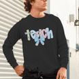 Coquette Bow Teach Teacher Happy First Day Back To School Unisex Long Sleeve T-Shirt, gift for family, gift for coworker Coquette Bow Teach Teacher Happy First Day Back To School Unisex Long Sleeve T-Shirt, gift for family, gift for coworker