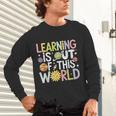 Learning Is Out Of This World Space Teacher Cute Groovy Unisex Long Sleeve T-Shirt, gift for family, gift for coworker Learning Is Out Of This World Space Teacher Cute Groovy Unisex Long Sleeve T-Shirt, gift for family, gift for coworker