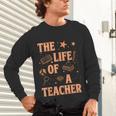 The Life Of A Teacher Back To School Women Men Unisex Long Sleeve T-Shirt, gift for family, gift for coworker