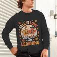 Retro Fall In Love With Learning Pumpkin Leaf Teacher Autumn Unisex Long Sleeve T-Shirt, gift for family, gift for coworker Retro Fall In Love With Learning Pumpkin Leaf Teacher Autumn Unisex Long Sleeve T-Shirt, gift for family, gift for coworker