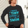 Swimming Teacher I Teach Tiny Humans To Swim Swim Instructor Unisex Long Sleeve T-Shirt, gift for family, gift for coworker Swimming Teacher I Teach Tiny Humans To Swim Swim Instructor Unisex Long Sleeve T-Shirt, gift for family, gift for coworker