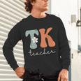 TK Teacher Retro Groovy Vintage Happy First Day Of School Unisex Long Sleeve T-Shirt, gift for family, gift for coworker