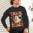 Trick Or Teach Halloween Shirt For Teacher Kids Floral Ghost Unisex Long Sleeve T-Shirt, gift for family, gift for coworker