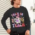Trick Or Teach Halloween Teacher Floral Ghost Groovy Unisex Long Sleeve T-Shirt, gift for family, gift for coworker Trick Or Teach Halloween Teacher Floral Ghost Groovy Unisex Long Sleeve T-Shirt, gift for family, gift for coworker