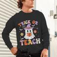 Trick Or Teach Teacher Groovy Ghost Halloween Teacher Unisex Long Sleeve T-Shirt, gift for family, gift for coworker