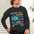 We'Re All Different But We Swim Together Elementary Teacher Unisex Long Sleeve T-Shirt, gift for family, gift for coworker We'Re All Different But We Swim Together Elementary Teacher Unisex Long Sleeve T-Shirt, gift for family, gift for coworker
