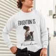 Education Is Freedom Teacher Books Black History Month Unisex Long Sleeve T-Shirt, gift for family, gift for coworker