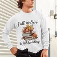 Fall In Love With Reading Book Autumn Teachers Pumpkins Unisex Long Sleeve T-Shirt, gift for family, gift for coworker