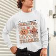 One Thankful Teacher Thanksgiving Groovy Fall Autumn Teacher Unisex Long Sleeve T-Shirt, gift for family, gift for coworker One Thankful Teacher Thanksgiving Groovy Fall Autumn Teacher Unisex Long Sleeve T-Shirt, gift for family, gift for coworker