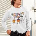 Trick Or Teach Candy Corn Pumpkin Ghost Teacher Unisex Long Sleeve T-Shirt, gift for family, gift for coworker