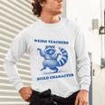 Weird Teachers Build Character Shirt Raccoon Dancing Unisex Long Sleeve T-Shirt, gift for family, gift for coworker Weird Teachers Build Character Shirt Raccoon Dancing Unisex Long Sleeve T-Shirt, gift for family, gift for coworker