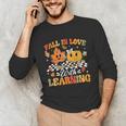 Fall In Love With Learning Fall Teacher Thanksgiving Retro Unisex Long Sleeve T-Shirt, funny gift Fall In Love With Learning Fall Teacher Thanksgiving Retro Unisex Long Sleeve T-Shirt, funny gift