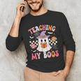 Groovy Teaching My Boos Teacher Ghost Halloween Teacher Unisex Long Sleeve T-Shirt, funny gift Groovy Teaching My Boos Teacher Ghost Halloween Teacher Unisex Long Sleeve T-Shirt, funny gift