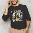 Learning Is Out Of This World Space Teacher Cute Groovy Unisex Long Sleeve T-Shirt, funny gift Learning Is Out Of This World Space Teacher Cute Groovy Unisex Long Sleeve T-Shirt, funny gift