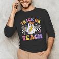 Trick Or Teach Groovy Halloween Teachers Unisex Long Sleeve T-Shirt, funny gift