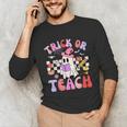 Trick Or Teach Halloween Teacher Floral Ghost Groovy Unisex Long Sleeve T-Shirt, funny gift Trick Or Teach Halloween Teacher Floral Ghost Groovy Unisex Long Sleeve T-Shirt, funny gift