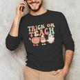 Trick Or Teach Pumpkin Candy Corn Ghost Halloween Teacher Unisex Long Sleeve T-Shirt, funny gift Trick Or Teach Pumpkin Candy Corn Ghost Halloween Teacher Unisex Long Sleeve T-Shirt, funny gift