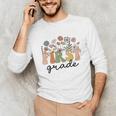 First Grade Teacher Wildflower Back To School Floral Outfits Unisex Long Sleeve T-Shirt, funny gift