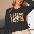 Groovy I Speak Fluent Toddler Daycare Provider Teacher Unisex Long Sleeve T-Shirt, funny design Groovy I Speak Fluent Toddler Daycare Provider Teacher Unisex Long Sleeve T-Shirt, funny design