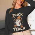 Halloween Teacher Shirts Women School Trick Or Teach Groovy Unisex Long Sleeve T-Shirt, funny design Halloween Teacher Shirts Women School Trick Or Teach Groovy Unisex Long Sleeve T-Shirt, funny design