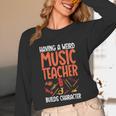 Having a Weird Music Teacher Builds Character Music Teacher Unisex Long Sleeve T-Shirt, funny design