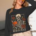 Read In Peace Skeleton Reading Book Halloween Teacher Unisex Long Sleeve T-Shirt, funny design