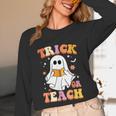 Retro Vintage Groovy Trick Or Teach Teacher Halloween For Men Women Kids Unisex Long Sleeve T-Shirt, funny design Retro Vintage Groovy Trick Or Teach Teacher Halloween For Men Women Kids Unisex Long Sleeve T-Shirt, funny design