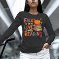 Fall In Love With Reading Autumn Thanksgiving Shirt Teacher Unisex Long Sleeve T-Shirt, novelty gifts, funny gifts