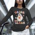 Groovy Halloween Trick Or Teach Retro Floral Ghost Teacher Unisex Long Sleeve T-Shirt, novelty gifts, funny gifts