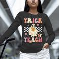 Groovy Teacher Halloween Retro Trick Or Teach Floral Ghost Unisex Long Sleeve T-Shirt, novelty gifts, funny gifts Groovy Teacher Halloween Retro Trick Or Teach Floral Ghost Unisex Long Sleeve T-Shirt, novelty gifts, funny gifts