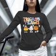 Trick Or Teach Cute Halloween Teacher Unisex Long Sleeve T-Shirt, novelty gifts, funny gifts