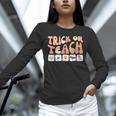 Trick Or Teach With Symbols Special Education Teacher Spooky Unisex Long Sleeve T-Shirt, novelty gifts, funny gifts