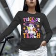 Trick Or Teach Teacher Ghost Teaching Fun Halloween Teacher Unisex Long Sleeve T-Shirt, novelty gifts, funny gifts Trick Or Teach Teacher Ghost Teaching Fun Halloween Teacher Unisex Long Sleeve T-Shirt, novelty gifts, funny gifts