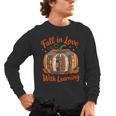Fall In Love With Learning Book Lover Autumn Pumpkin Teacher Men's Long Sleeve T-Shirt, trending gift Fall In Love With Learning Book Lover Autumn Pumpkin Teacher Men's Long Sleeve T-Shirt, trending gift