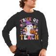Trick Or Teach Groovy Teacher Ghost Halloween Teacher Men's Long Sleeve T-Shirt, trending gift Trick Or Teach Groovy Teacher Ghost Halloween Teacher Men's Long Sleeve T-Shirt, trending gift