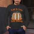 Fall In Love With Reading Pumpkin Autumn Librarians Teacher Men's Long Sleeve T-Shirt, funny design