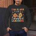 Groovy Fall In Love With Learning Autumn Pumpkin Teacher Men's Long Sleeve T-Shirt, funny design