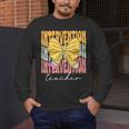 Interventionist Teacher Groovy Coquette Bow Back To School Men's Long Sleeve T-Shirt, funny design Interventionist Teacher Groovy Coquette Bow Back To School Men's Long Sleeve T-Shirt, funny design