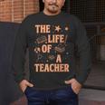 The Life Of A Teacher Back To School Women Men Men's Long Sleeve T-Shirt, funny design The Life Of A Teacher Back To School Women Men Men's Long Sleeve T-Shirt, funny design
