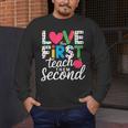 Love Them First Teach Them Second Teacher Student Love Quote Men's Long Sleeve T-Shirt, funny design