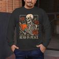 Read In Peace Skeleton Reading Book Halloween Teacher Men's Long Sleeve T-Shirt, funny design Read In Peace Skeleton Reading Book Halloween Teacher Men's Long Sleeve T-Shirt, funny design