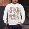 Team TK Teacher Christmas Groovy Smile Face Girl Boy Kid TK Men's Long Sleeve T-Shirt, funny design