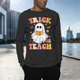 Retro Vintage Groovy Trick Or Teach Teacher Halloween For Men Women Kids Men's Long Sleeve T-Shirt, gift for family, gift for coworker