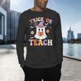 Trick Or Teach Teacher Groovy Ghost Halloween Teacher Men's Long Sleeve T-Shirt, gift for family, gift for coworker