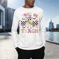 Trick Or Teach Groovy Teacher Halloween Retro Floral Ghost Men's Long Sleeve T-Shirt, gift for family, gift for coworker
