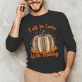 Fall In Love With Reading Pumpkin Autumn Librarians Teacher Men's Long Sleeve T-Shirt, novelty gifts, funny gifts