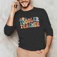 Groovy Toddler Teacher Appreciation Back To School Men's Long Sleeve T-Shirt, novelty gifts, funny gifts Groovy Toddler Teacher Appreciation Back To School Men's Long Sleeve T-Shirt, novelty gifts, funny gifts
