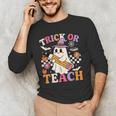 Retro Floral Ghost Trick Or Teach Groovy Teacher Halloween Men's Long Sleeve T-Shirt, novelty gifts, funny gifts