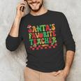 Santas Favorite Teacher Retro Groovy Christmas Xmas Women Men's Long Sleeve T-Shirt, novelty gifts, funny gifts Santas Favorite Teacher Retro Groovy Christmas Xmas Women Men's Long Sleeve T-Shirt, novelty gifts, funny gifts
