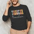 Toddler Teacher Retro Groovy Women Happy First Day Of School Men's Long Sleeve T-Shirt, novelty gifts, funny gifts
